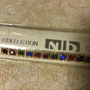 2 Tennis Bracelets  new, never worn, about 7 1/2" both are gold metal